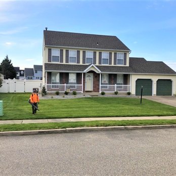 Job Done Right Landscaping - a man standing in front of a house - Gutter Services Near Me - Pitman, New Jersey Job Done Right Landscaping - a man standing in front of a house - Gutter Services Near Me - Pitman, New Jersey