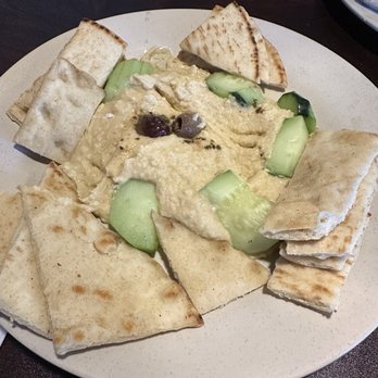 Nikos Greek Kitchen - Toasted pita pieces and delicious hummus! - Greek Near Me - Sparks, Nevada
