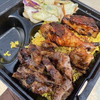 Doc's Street Grill - Combination platter with jerk chicken & pork w/ island rice and cabbage. - Chicken Wings Near Me - Roanoke, Texas