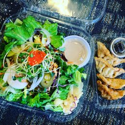 Tsunami bowl: spicy ahi on salad Gyoza