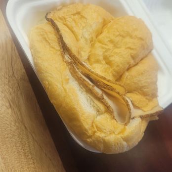 Lucky Goat Coffee - TURKEY AND CHEESE CROISSANT SANDWICH ($6.50): Savory sandwich of turkey and cheese between a buttery croissant. - Coffee & Tea Near Me - Orlando, Florida Lucky Goat Coffee - TURKEY AND CHEESE CROISSANT SANDWICH ($6.50): Savory sandwich of turkey and cheese between a buttery croissant. - Coffee & Tea Near Me - Orlando, Florida