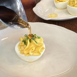 Deviled egg with hot honey sauce Deviled egg with hot honey sauce