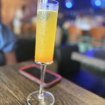 Virgil's Gullah Kitchen & Bar - Passionfruit mimosa - Southern Near Me - Atlanta, Georgia Virgil's Gullah Kitchen & Bar - Passionfruit mimosa - Southern Near Me - Atlanta, Georgia