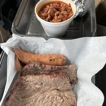 Big Vic's BBQ - 1 meat Combo with 1 side (Brisket & Brisket Beans) side of jalapeño cheese sausage.  Combo $16.00 Sausage $6.00 - Barbeque Near Me - Turlock, California