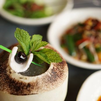 The Toasted Coconut - Seaward - Rhum Blanc JM, fresh coconut water, lime, mint, falernum, served in a young coconut - New American Near Me - Houston, Texas The Toasted Coconut - Seaward - Rhum Blanc JM, fresh coconut water, lime, mint, falernum, served in a young coconut - New American Near Me - Houston, Texas