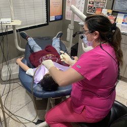 Joseph Eiswert, DMD - SmileMakers - Teeth cleaning with Karina