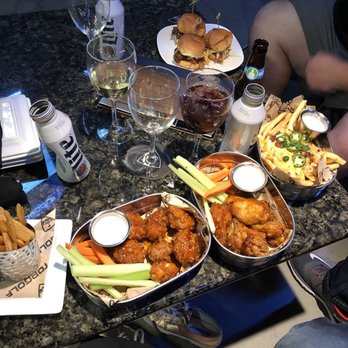Topgolf - Asian Glaze chicken wings, loaded fries and pulled pork sliders. - New American Near Me - Miami Gardens, Florida Topgolf - Asian Glaze chicken wings, loaded fries and pulled pork sliders. - New American Near Me - Miami Gardens, Florida