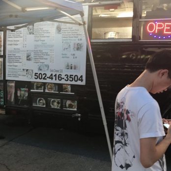 Tacos Guerra - a man standing in front of a food truck - Food Trucks Near Me - Louisville, Kentucky Tacos Guerra - a man standing in front of a food truck - Food Trucks Near Me - Louisville, Kentucky