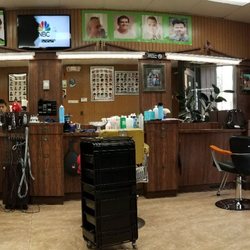 Kim's Barber Shop - Really nice, clean barbershop. Mr. Kim obviously takes great care of the shop and it shows :)