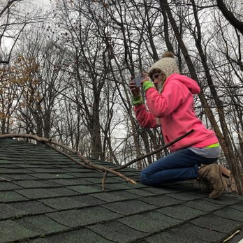Zion Artisan - a woman sitting on the roof of a house - Tree Services Near Me - Painesville, Ohio Zion Artisan - a woman sitting on the roof of a house - Tree Services Near Me - Painesville, Ohio
