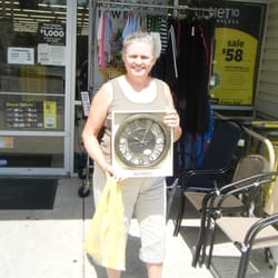Dollar General - Scruffy customer holding up scruffy clock.