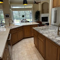 Countertop & Cabinet Concierge - Wrap it in porcelain they say, you got it!  Highlighted island and full height splash.  Fireplace and dining table to match