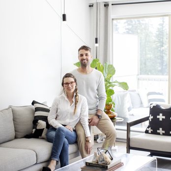 Schedio Spaces - a man and a woman sitting on a couch - General Contractors Near Me - Vancouver, British Columbia Schedio Spaces - a man and a woman sitting on a couch - General Contractors Near Me - Vancouver, British Columbia