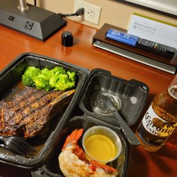 Outlaw ribeye with lobster tail, to go order. Outlaw ribeye with lobster tail, to go order.