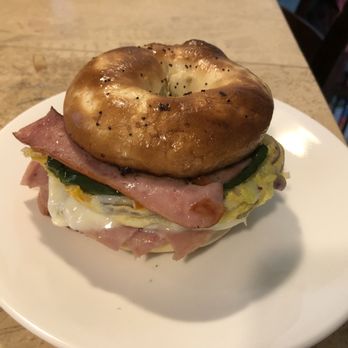 Jolly Donuts - Ham, sausage, with vegetable omelette, on onion bagel with jalapeño and avocado added. - Donuts Near Me - Canoga Park, California