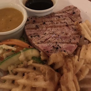 Muelle 7 - Seared Tuna with teriyaki sauce and chutney in the side, sautés veggies and waffle fries.  I'd nix the fries but otherwise outstanding. - Cocktail Bars Near Me - Isla Mujeres, ROO