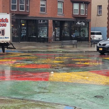 New City Cafe & Roastery - Front area with artistic streetscape, a bit rainy on that morning of 4/10/24 - Coffee & Tea Near Me - Rochester, New York