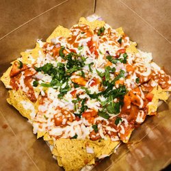 Narula’s Authentic Indian Cuisine - Butter Chicken Nachos Supreme