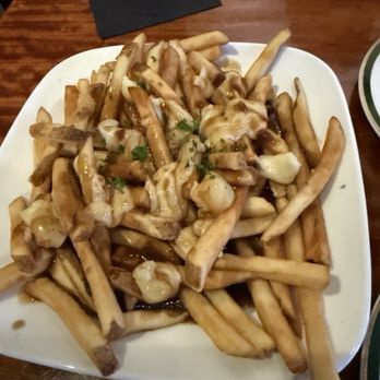 Freeman's Grub & Pub - Fries with gravy and cheese curds - New American Near Me - Greensboro, North Carolina