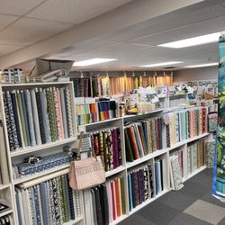 The Quilting Needle - Bolts of fabric