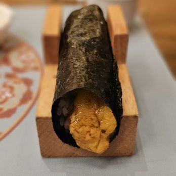 Tabe Fusion - A handroll, loaded with salmon and uni (sea urchin) - Asian Fusion Near Me - Ann Arbor, Michigan