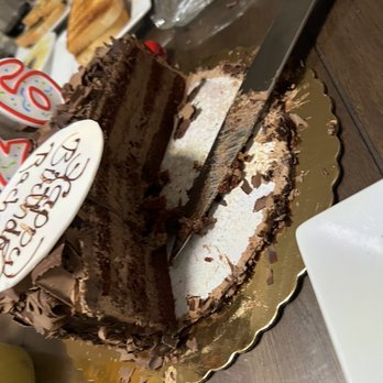 Passion Bakery Cafe - Layers of decadent chocolate! Dark chocolate mousse cake for the win - Bakeries Near Me - Silver Spring, Maryland