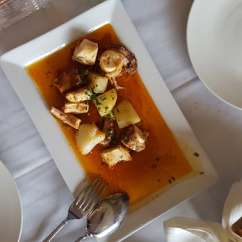 La Vinia - Poached octopus and potatoes braised in olive oil and pimentón (Spanish paprika). - Spanish Near Me - Toronto, Ontario
