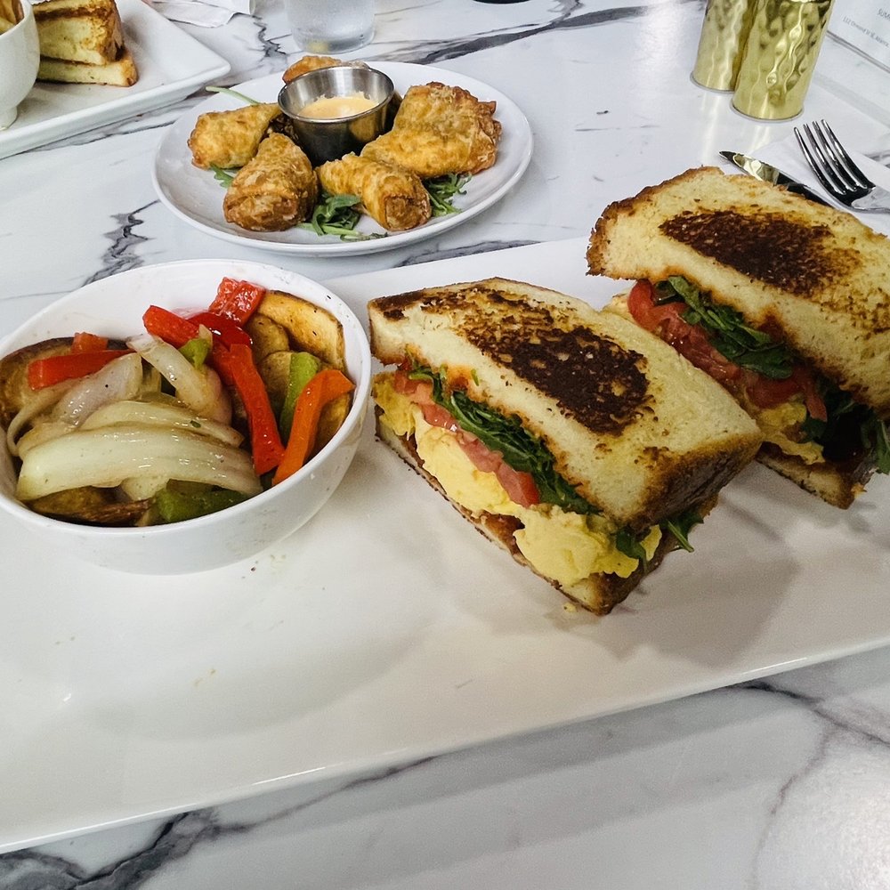 Poach Social - Bacon egg jam sandwich - Breakfast & Brunch Near Me - Atlanta, Georgia Poach Social - Bacon egg jam sandwich - Breakfast & Brunch Near Me - Atlanta, Georgia