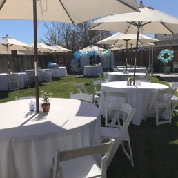 Baby Shower setup. Tables, chairs and umbrellas provided by Santiago Party Rentals.