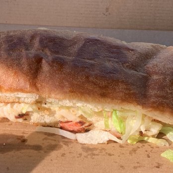 Mancino's Pizza and Grinders - Half size crabmeat grinder.  Crispy outside buttery soft inside.  Decent amount of filling. - Pizza Near Me - Fremont, Michigan
