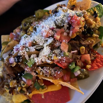 The Stewed Cow - Infamous Nachos - Cocktail Bars Near Me - Hoboken, New Jersey The Stewed Cow - Infamous Nachos - Cocktail Bars Near Me - Hoboken, New Jersey