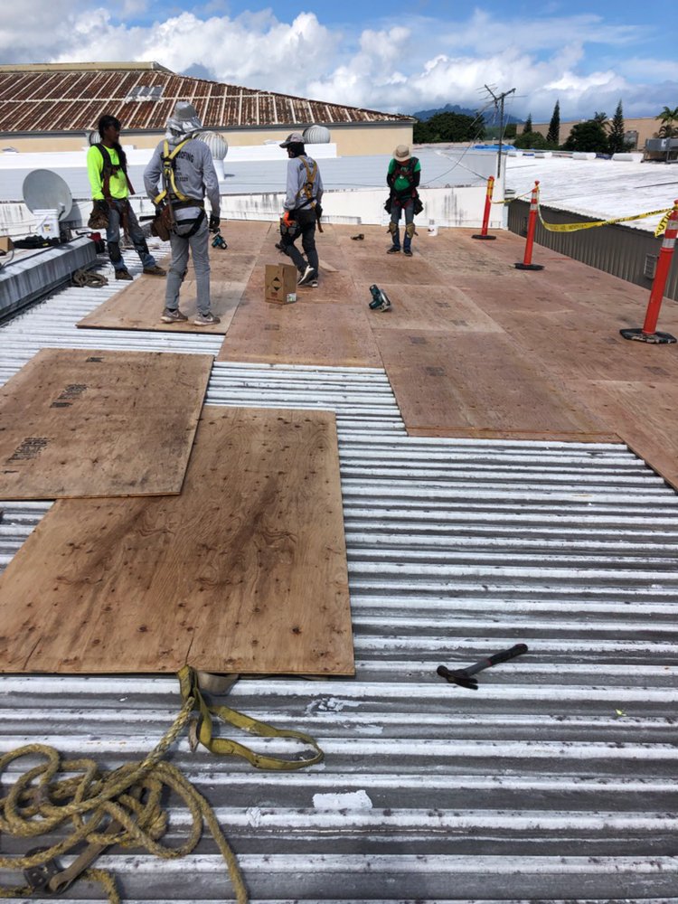 Slide of New Era Roofing