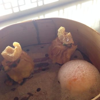 A. Wong - Dim sum. That's pork crackling on top of one and foam on the other. Delicious. - Chinese Near Me - London, XGL A. Wong - Dim sum. That's pork crackling on top of one and foam on the other. Delicious. - Chinese Near Me - London, XGL