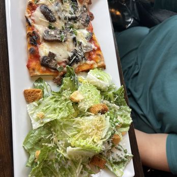 Roots95 - Flatbread mushroom medley with Caesar salad - New American Near Me - Johnston, Iowa
