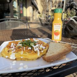 Penelope's Coffee And Tea - Bacon Womelette wit some OJ hits hard
