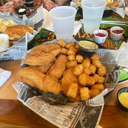Six piece chicken tender and tater tots with honey mustard.