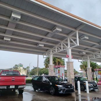 Wawa - a gas station with cars parked under a canopy - Gas Stations Near Me - Orlando, Florida Wawa - a gas station with cars parked under a canopy - Gas Stations Near Me - Orlando, Florida