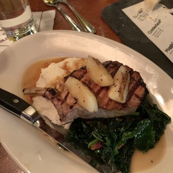 Old Ebbitt Grill - Duloc pork chop; had this the first time I came. Perfectly seared and moist, cheese grits and collard greens. - Bars Near Me - Washington, DC, District of Columbia Old Ebbitt Grill - Duloc pork chop; had this the first time I came. Perfectly seared and moist, cheese grits and collard greens. - Bars Near Me - Washington, DC, District of Columbia