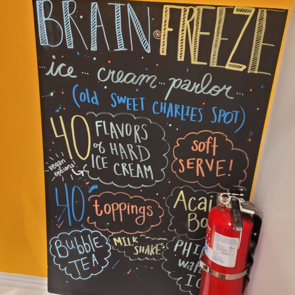 Brain Freeze - a fire extinguisher next to a chalk board - Ice Cream & Frozen Yogurt Near Me - Haddonfield, New Jersey