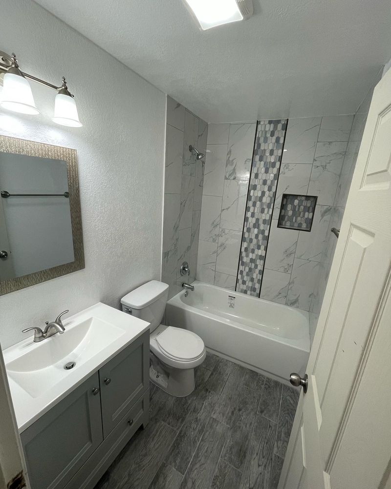 Slide of His & Hers Renovations