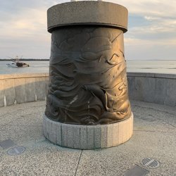 Steveston Fishermen's Memorial - Bas relief scenes of the sea on the central base.