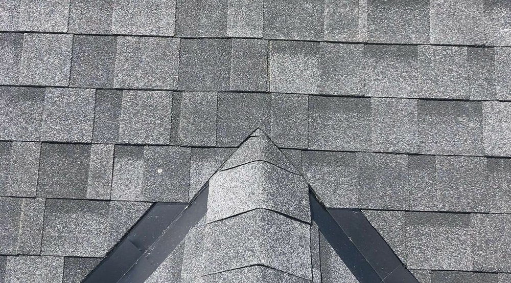 Slide of Bystrom Roofing