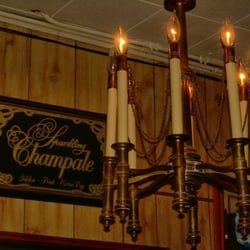 How can you not like a place with a Champale sign,  simulated wood panels and a chandelier?!?!