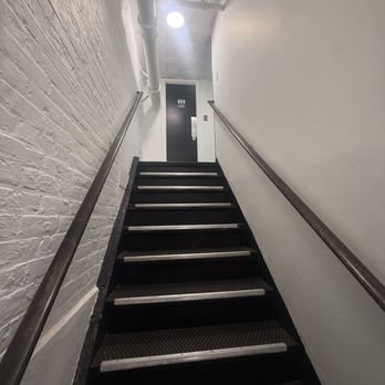 Bobbi’s - Stairs to the two restrooms up and away from the dining area - Pizza Near Me - New Haven, Connecticut