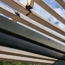 FIXIT Oahu - Before-dry rot in pergola beams and spacers.