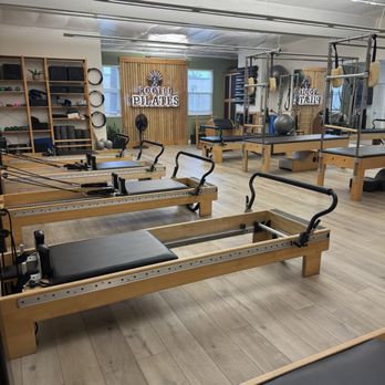Rooted Pilates - Reformers, Cadillac, mixed apparatus - Pilates Near Me - Costa Mesa, California Rooted Pilates - Reformers, Cadillac, mixed apparatus - Pilates Near Me - Costa Mesa, California