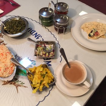 India Quality Restaurant - $9 - India tea, curry cabbage salad, some other appetizer, Basmati rice, saag panner - Indian Near Me - Boston, Massachusetts