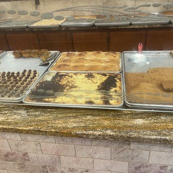 Nablus Sweets - Wish I knew names. Nothing was labeled. The one on the right might be Harisa - Bakeries Near Me - Brooklyn, New York