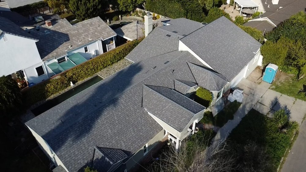 Slide of SLR Roofing