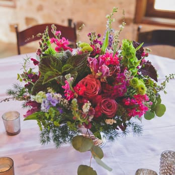 Blackbird Floral - Each table arrangement had a slightly different feel. Lea incorporated some living plants which guests actually took home and replanted. - Florists Near Me - Austin, Texas